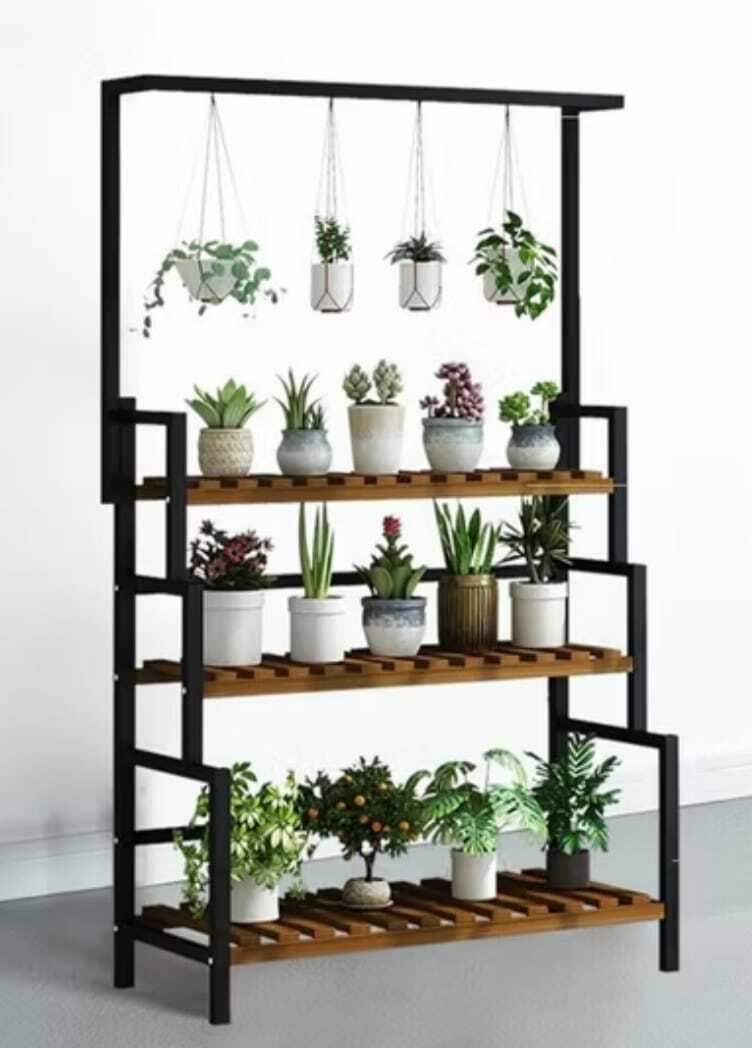 Wooden tiered planter stand with potted plants